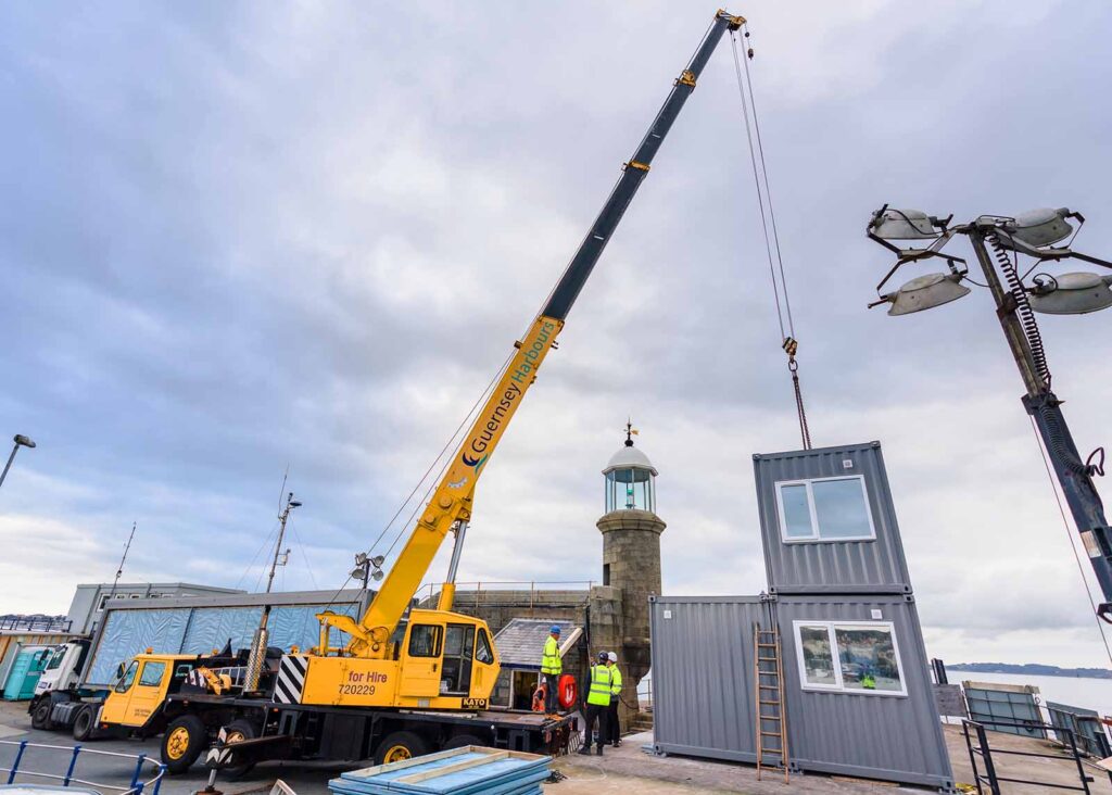 crane st peter port pier light house container control centre